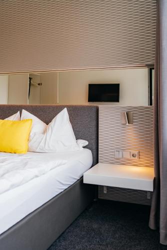 Hotel Benther Bergにあるベッド