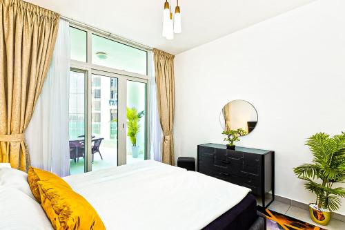 Palm Chateau Apartments Dubai tesisinde bir odada yatak veya yataklar