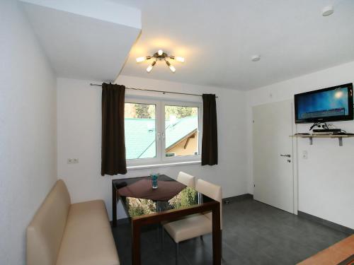TV a/nebo společenská místnost v ubytování Apartment Collina by Interhome