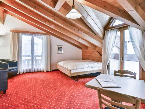 Postel nebo postele na pokoji v ubytování Apartment Chalet Abendrot apARTments-9 by Interhome