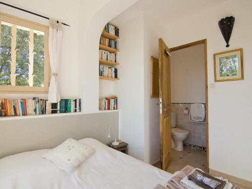Katil atau katil-katil dalam bilik di Holiday Home Les Cairnes by Interhome