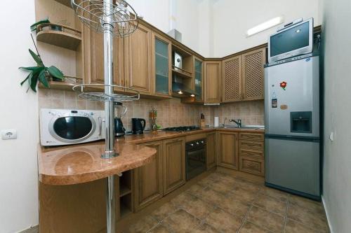 Кухня или мини-кухня в Be My Guest - Apartments for trips
