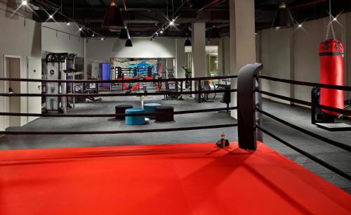 a boxing ring with a red carpet in a gym at Wanda Vista Istanbul in Istanbul