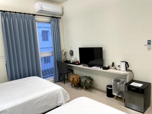 Postel nebo postele na pokoji v ubytování Bloom B&B