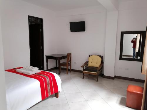 Postel nebo postele na pokoji v ubytování Chachapoyas Backpackers Hostal Boutique