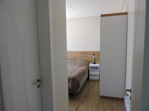 Łóżko lub łóżka w pokoju w obiekcie Apartamento Lindo Central