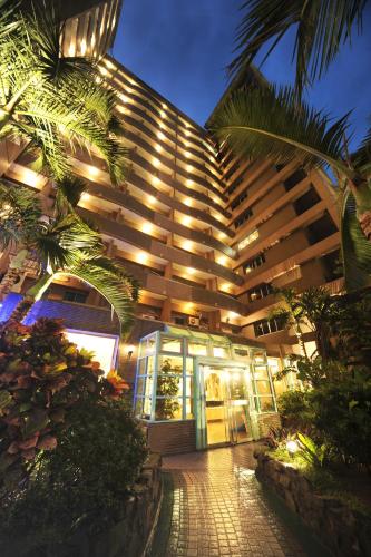 a building with lights on the side of it at Kenting Holiday Hotel in Hengchun