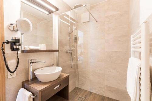Ένα μπάνιο στο Hotel Alpenland