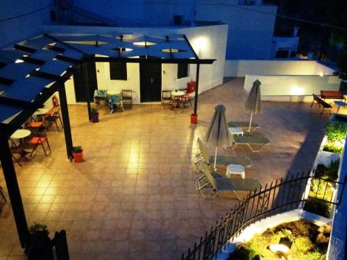 an overhead view of a patio at night at Little Lindos Sea View Studios in Líndos