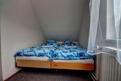 Postel nebo postele na pokoji v ubytování Chata Zátiší