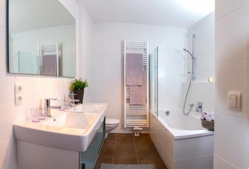 A bathroom at Steinbock Superior Appartement