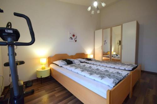 a bedroom with a large bed in a room at Apartments Zrinka in Omišalj