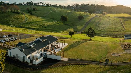 an aerial view of a house in the middle of a field at Beechmont Estate in Beechmont