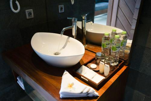 Koupelna v ubytování Bali Karma Sajtra Hotel