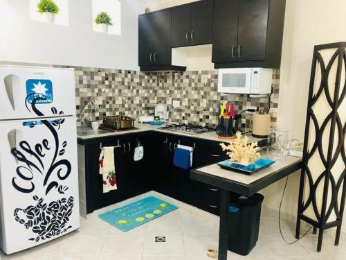 Nhà bếp/bếp nhỏ tại Casa Tonsupa Club del Pacifico