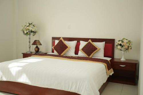 Кровать или кровати в номере Đào Hùng Hotel