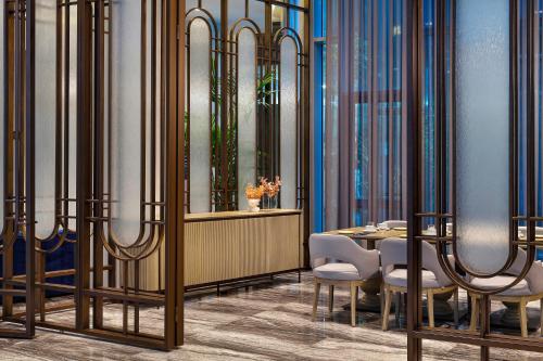 a dining room with a table and chairs at Wanda Vista Istanbul in Istanbul
