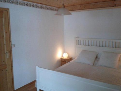 Postel nebo postele na pokoji v ubytování Haus Perlgut - Maraun Alessia