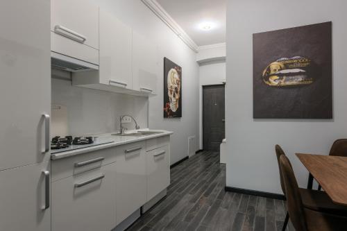 Apart Hotel Fusionにあるキッチンまたは簡易キッチン