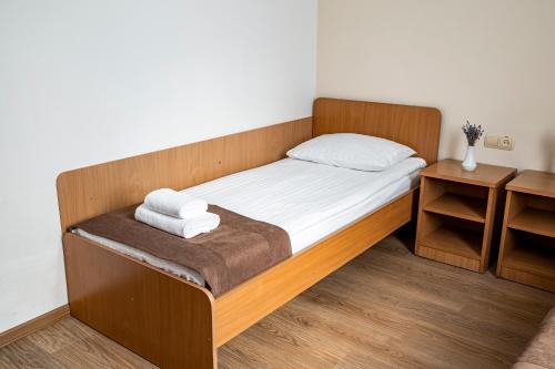 Ένα ή περισσότερα κρεβάτια σε δωμάτιο στο Hotel Galaktika