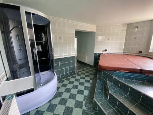 Koupelna v ubytování A- Villa (Vendégház)