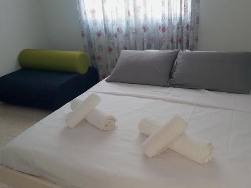 Ένα ή περισσότερα κρεβάτια σε δωμάτιο στο Cozy holyday apartament