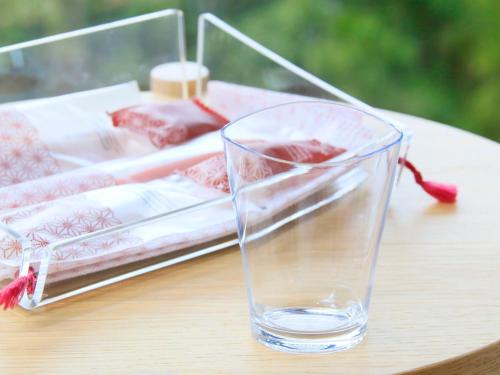 a glass vase sitting on top of a table at Hot Spring Inn Hakone Suisen in Hakone