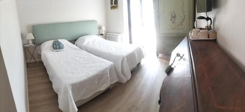 A bed or beds in a room at Al Giardino Segreto