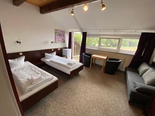 Postel nebo postele na pokoji v ubytování K 357 - Low budget Hotel in Ratekau bei Lübeck