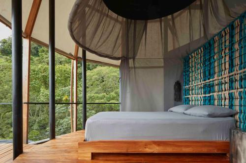 A bed or beds in a room at Art Villas Costa Rica