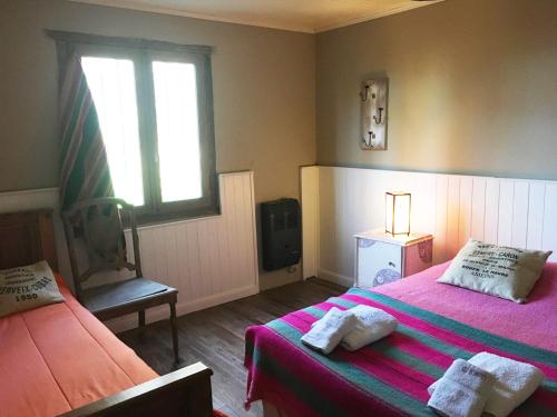 Tempat tidur dalam kamar di Casa de Campo La Colorada