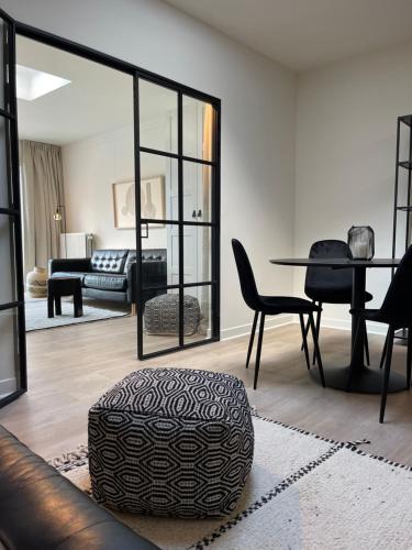 Φωτογραφία από το άλμπουμ του Unique luxury apartment with cosy garden! στη Γάνδη