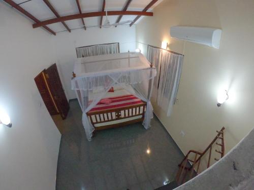 an overhead view of a room with a bed at Villa Girilena in Hikkaduwa