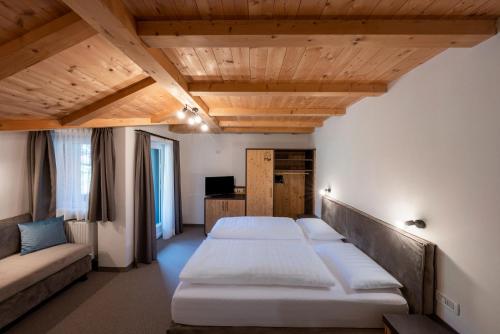 Postel nebo postele na pokoji v ubytování Hotel Monte44