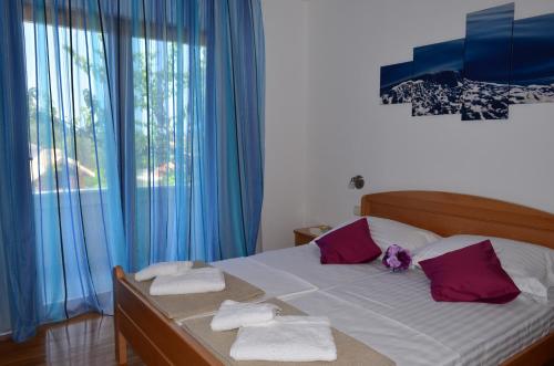 Katil atau katil-katil dalam bilik di Apartments Bošković