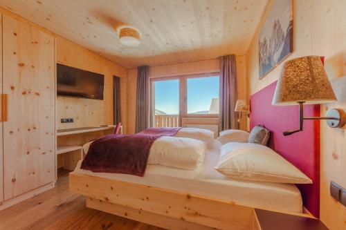 a bedroom with a large bed in a room at Panorama in Sesto