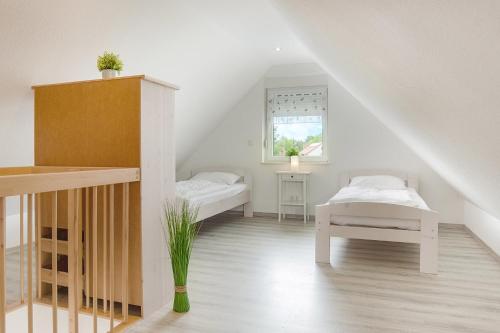 Ένα ή περισσότερα κρεβάτια σε δωμάτιο στο Residenz 3