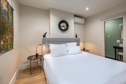 Katil atau katil-katil dalam bilik di Appartements Emile Fourcand -Your Bordeaux Home