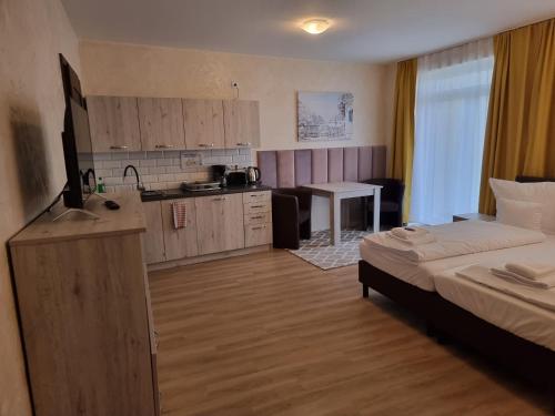 Ένα ή περισσότερα κρεβάτια σε δωμάτιο στο Apartments Oberschlesien