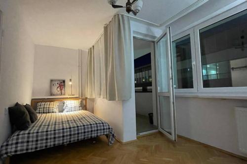 Posteľ alebo postele v izbe v ubytovaní Super Apartament SAWA 2 Metro WiFi 500 mbs TV'50 Netflix HBO AppleTV+