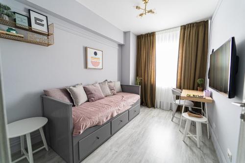 TV a/nebo společenská místnost v ubytování Delux Suite - Apartament 100 de m2 cu 3 camere și parcare gratuită, lângă Arena Mall in Centrul Bacău