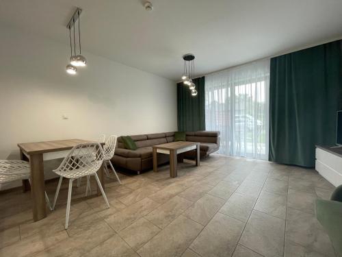 Posedenie v ubytovaní Apartament Biała Róża
