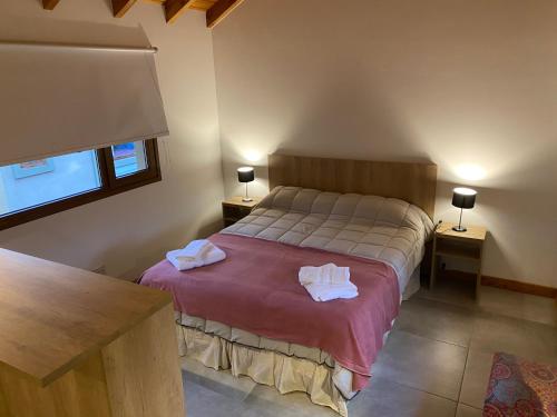 Postel nebo postele na pokoji v ubytování Loretta 210