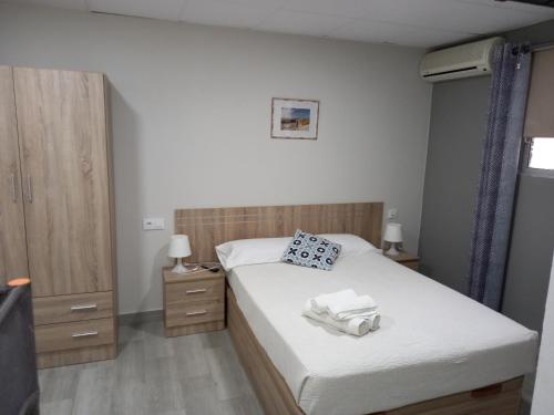 Postel nebo postele na pokoji v ubytování Casa Inocencio