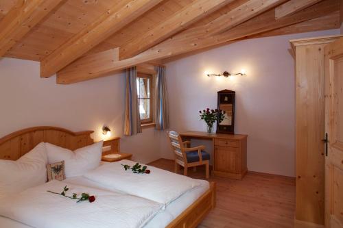 Ένα ή περισσότερα κρεβάτια σε δωμάτιο στο Ferienhof Weissenbach