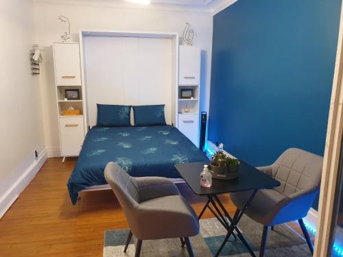 Krevet ili kreveti u jedinici u okviru objekta Le cœur de Troyes - Appartement & Studio