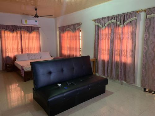Una cama o camas en una habitación de SWATSON HOTEL