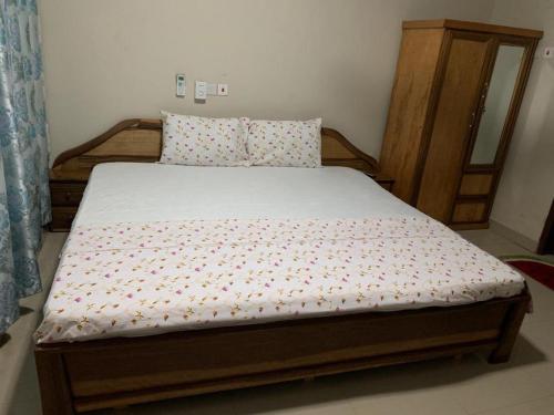 Una cama o camas en una habitación de SWATSON HOTEL