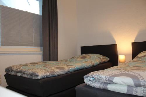Katil atau katil-katil dalam bilik di Monteurwohnung Ferienwohnung Rose in Isenbüttel Nähe Gifhorn, Wolfsburg, Braunschweig