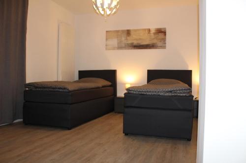 Ένα ή περισσότερα κρεβάτια σε δωμάτιο στο Apartment Hanske